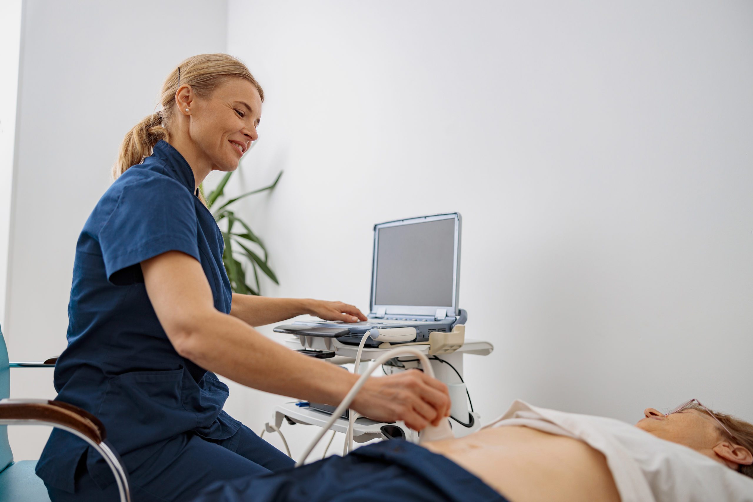 bigstock-Doctor-Ultrasound-Examine-Seni-456397199-2-scaled-2