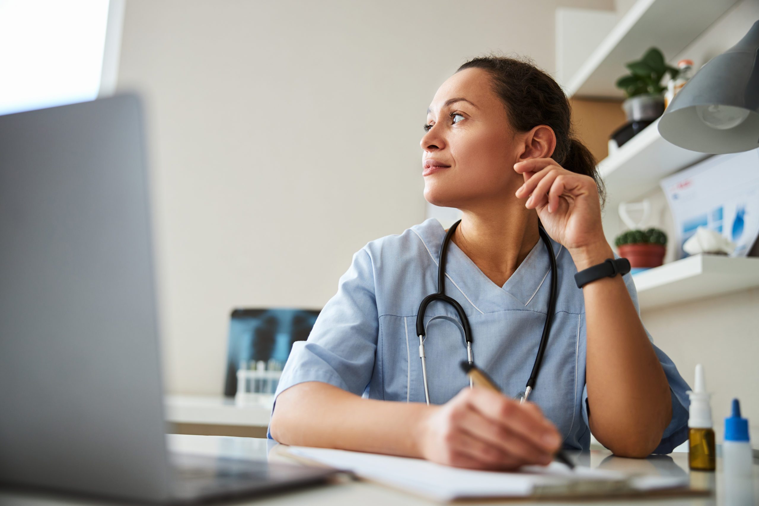 bigstock-Dreaming-Medic-Rubbing-Her-Ear-404177432-scaled-2